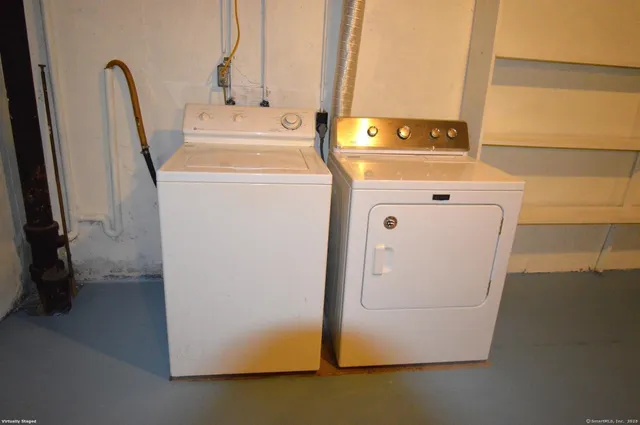 a utility room with dryer and washer