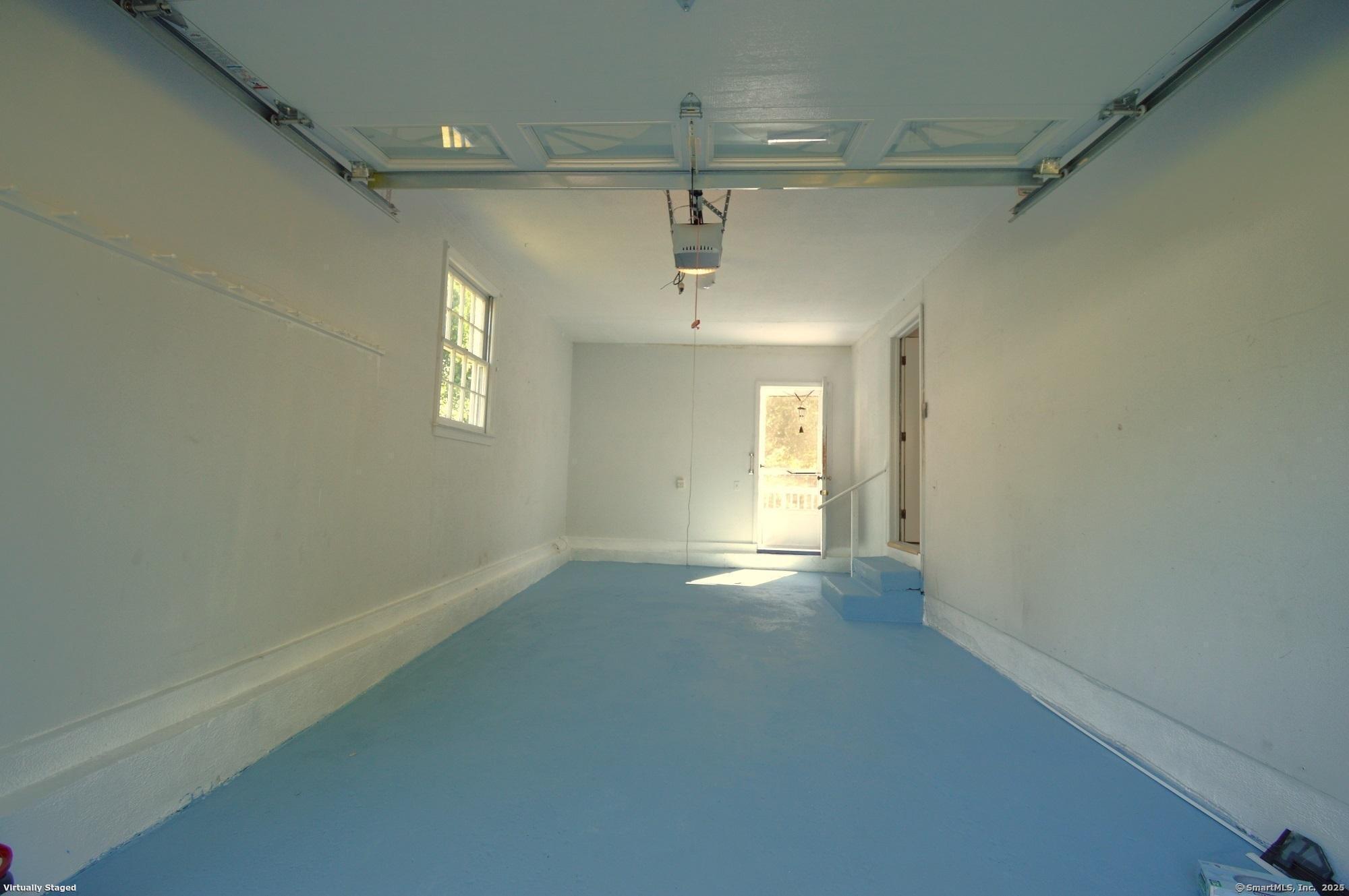 18 Overbrook Road West Hartford, CT 06107 - Photo 34 of 37 an empty room with windows and entrance