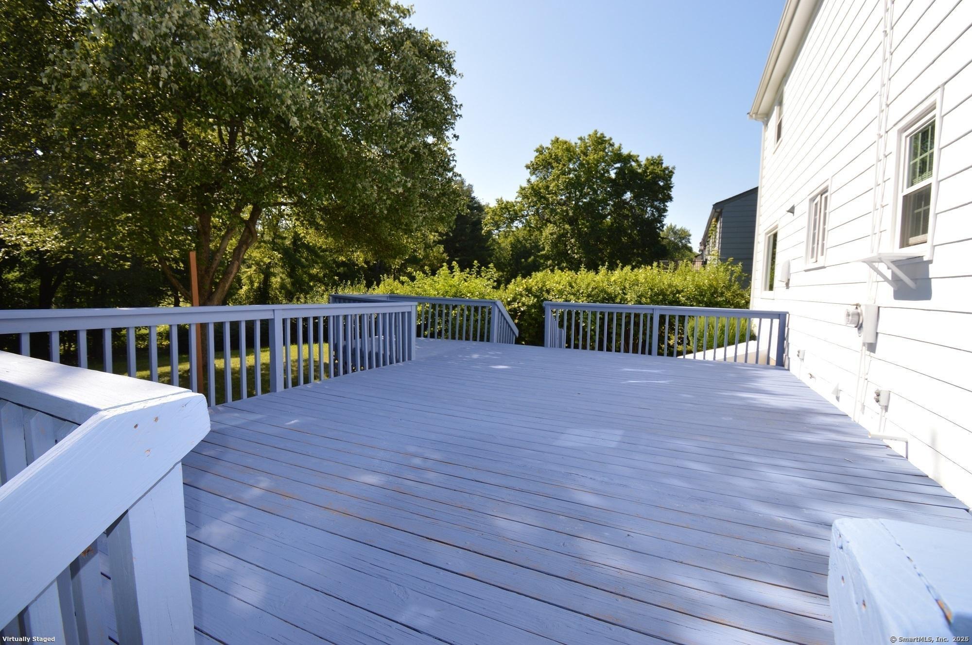 18 Overbrook Road West Hartford, CT 06107 - Photo 35 of 37 a view of a deck with a wooden fence