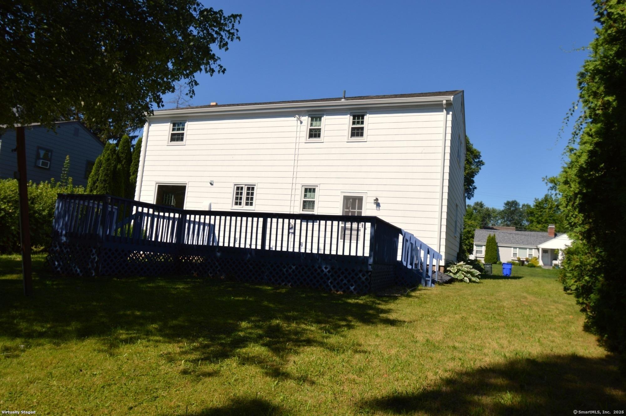 18 Overbrook Road West Hartford, CT 06107 - Photo 36 of 37 a view of a house with a yard