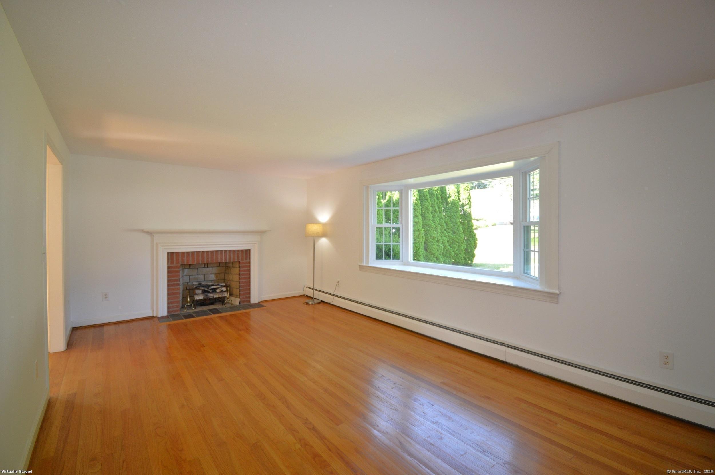 18 Overbrook Road West Hartford, CT 06107 - Photo 5 of 37 an empty room with windows