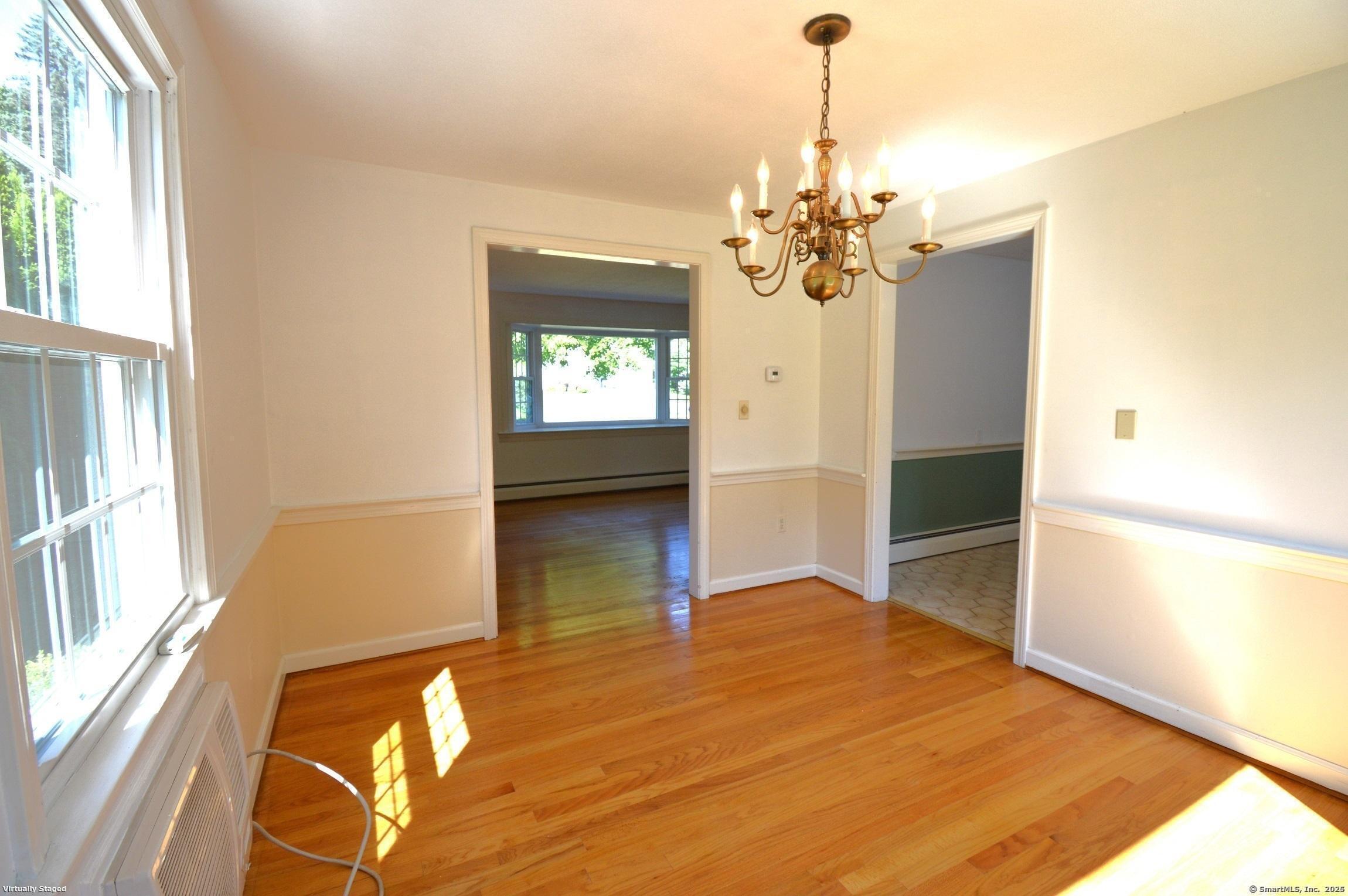 18 Overbrook Road West Hartford, CT 06107 - Photo 8 of 37 a view of livingroom with chandelier