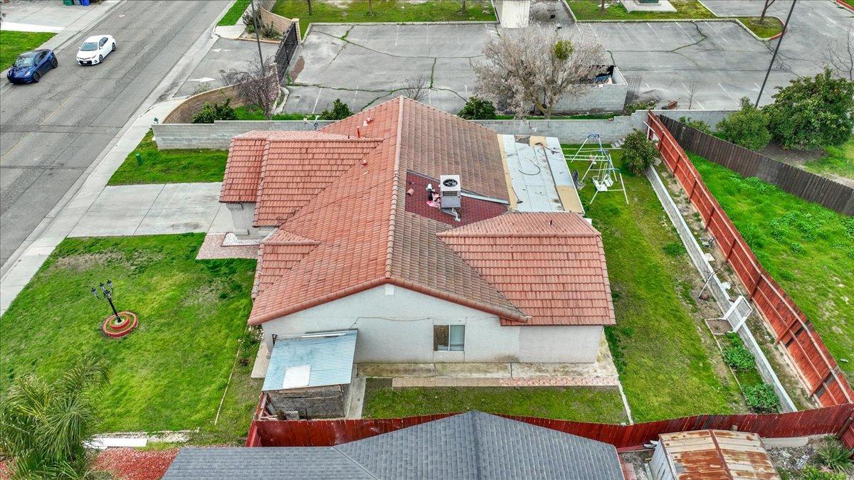 14440 West E Street Kerman, CA 93630 - Photo 12 of 13 a aerial view of a house