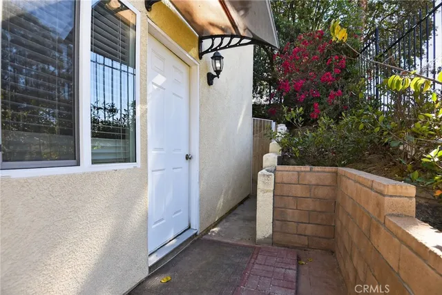 a kitchen with a stove a microwave and cabinets