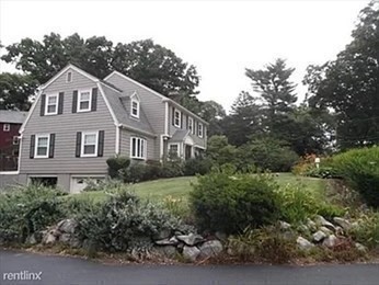 45 Wellesley Road Belmont, MA 02478 - Photo 41 of 42 a front view of a house with a yard