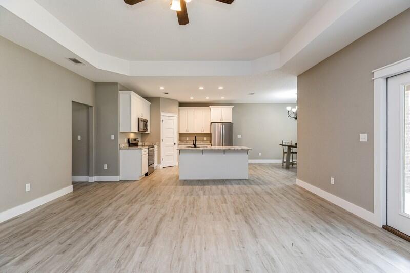 7656 4 Flags Road Laurel Hill, FL 32567 - Photo 7 of 52 LIVING ROOM