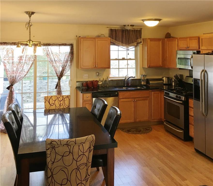 34 Oil Mill Road, Unit 2 Danbury, CT 06810 - Photo 1 of 1 Gorgeous updated kitchen with sliders out to private stone patio
