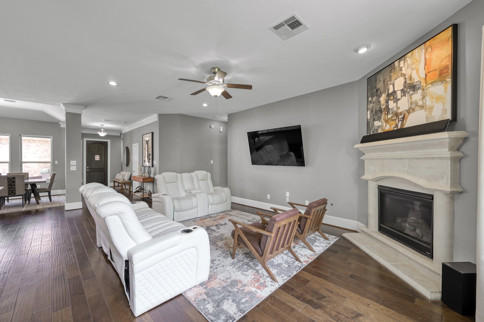 31714 Pierwood Court Spring, TX 77386 - Photo 15 of 49 a living room with furniture a fireplace and a flat screen tv