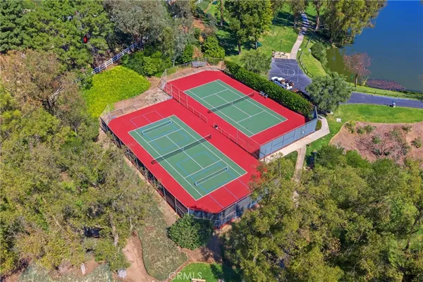 a view of a lake with a yard