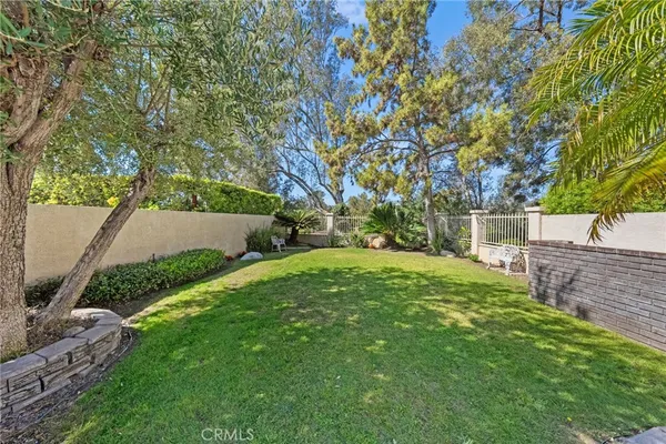 a view of a swimming pool with a garden