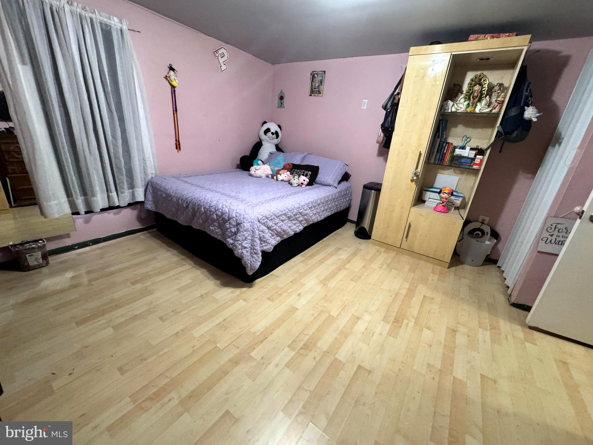 279-281 Arch Street Palmyra, NJ 08065 - Photo 11 of 29 a bedroom with a bed and a window