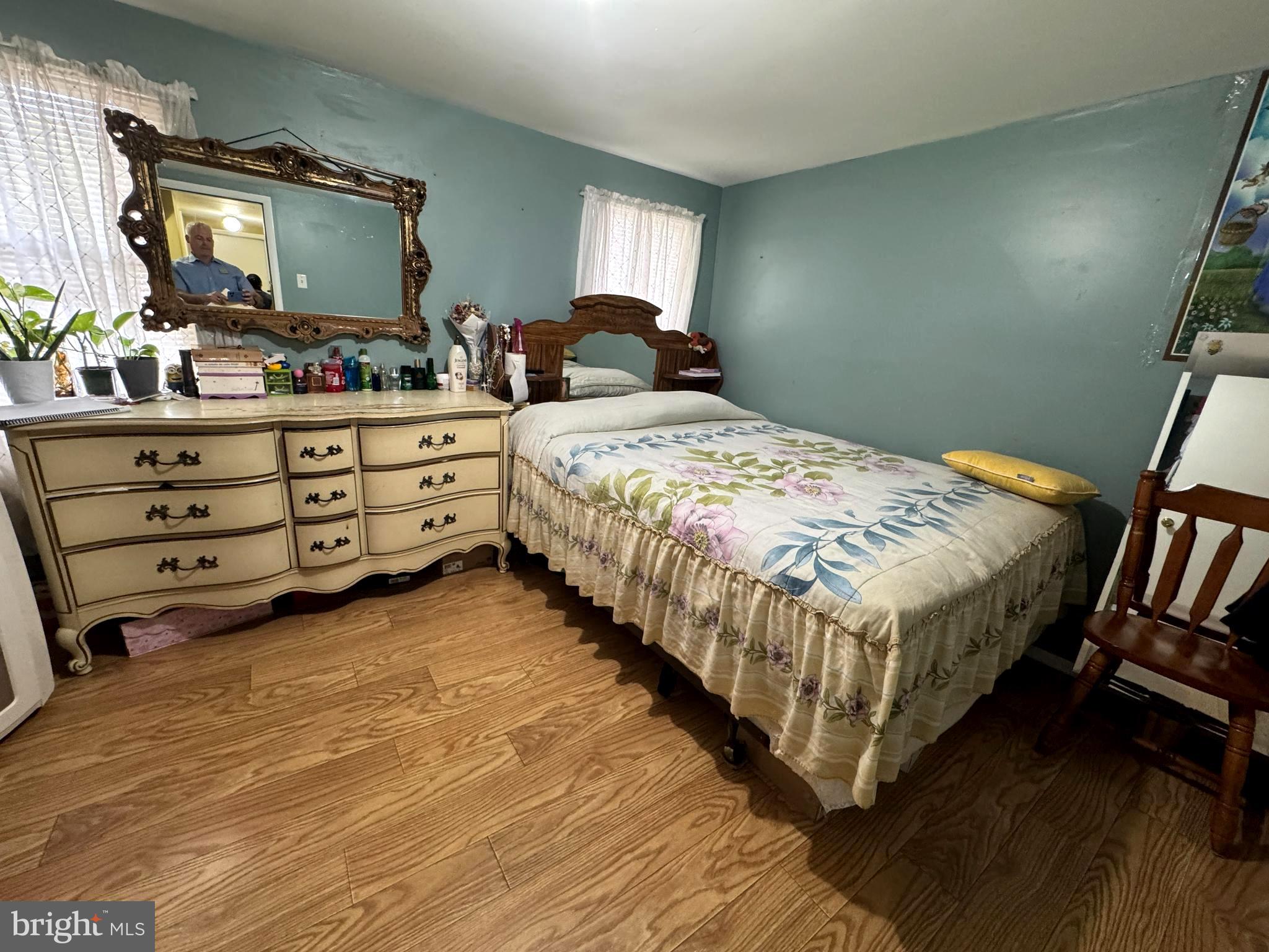 279-281 Arch Street Palmyra, NJ 08065 - Photo 12 of 29 a bedroom with a bed and window