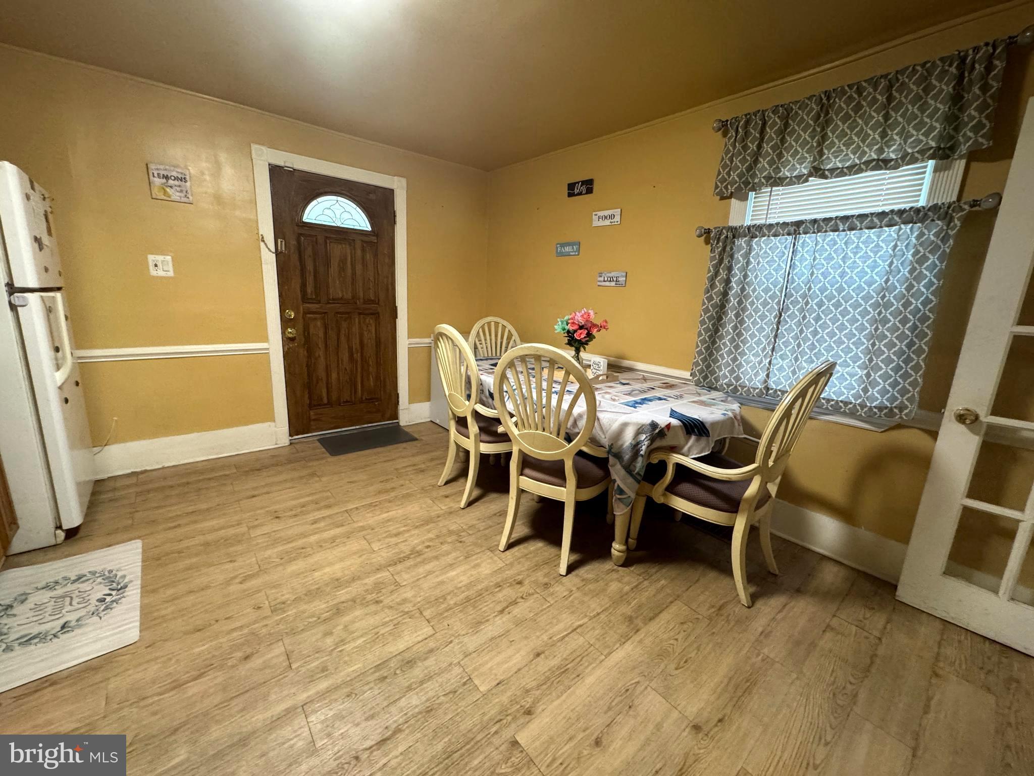 279-281 Arch Street Palmyra, NJ 08065 - Photo 24 of 29 a view of a dining room with furniture and wooden floor