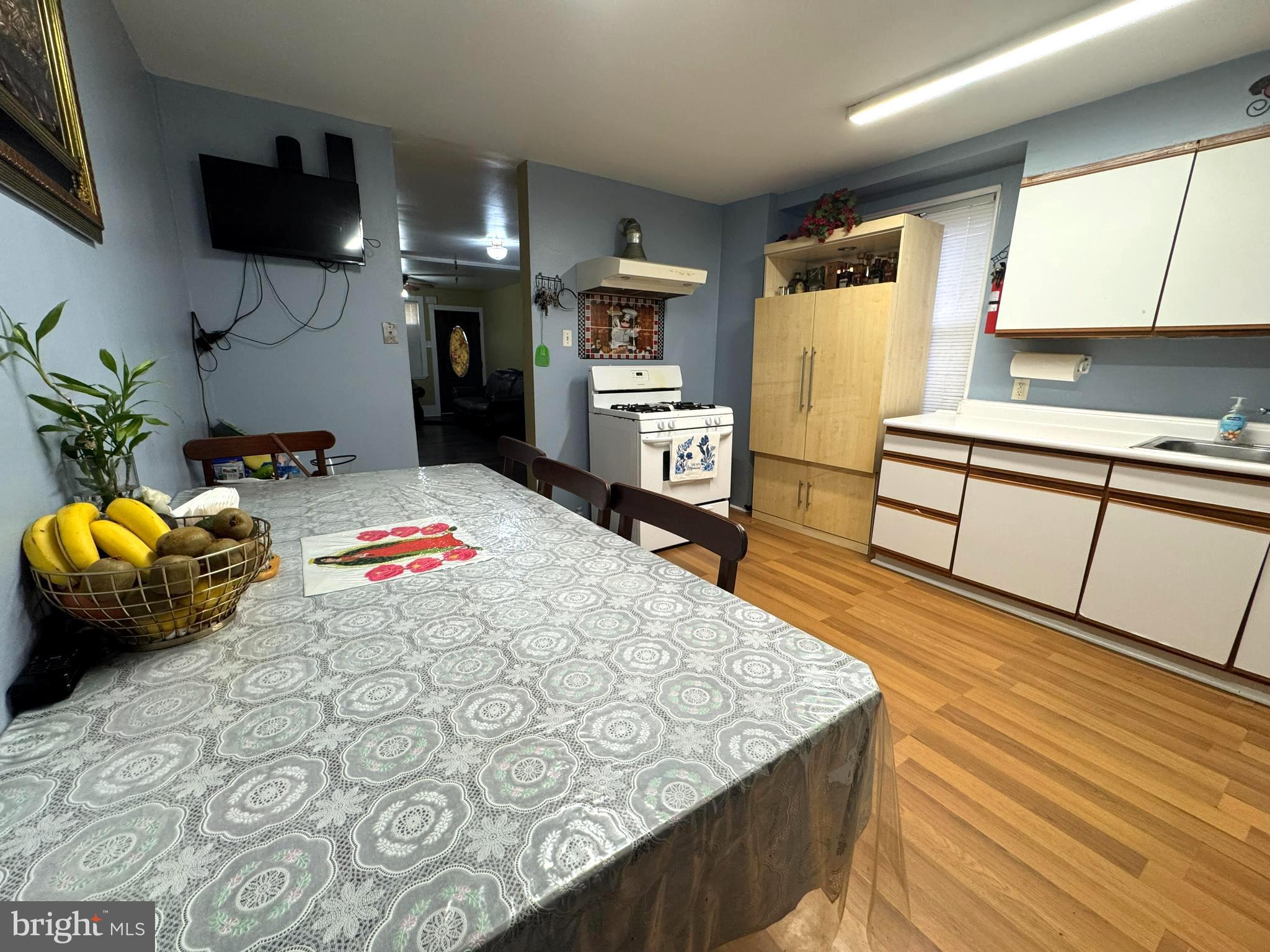 279-281 Arch Street Palmyra, NJ 08065 - Photo 26 of 29 a living room with furniture and a flat screen tv