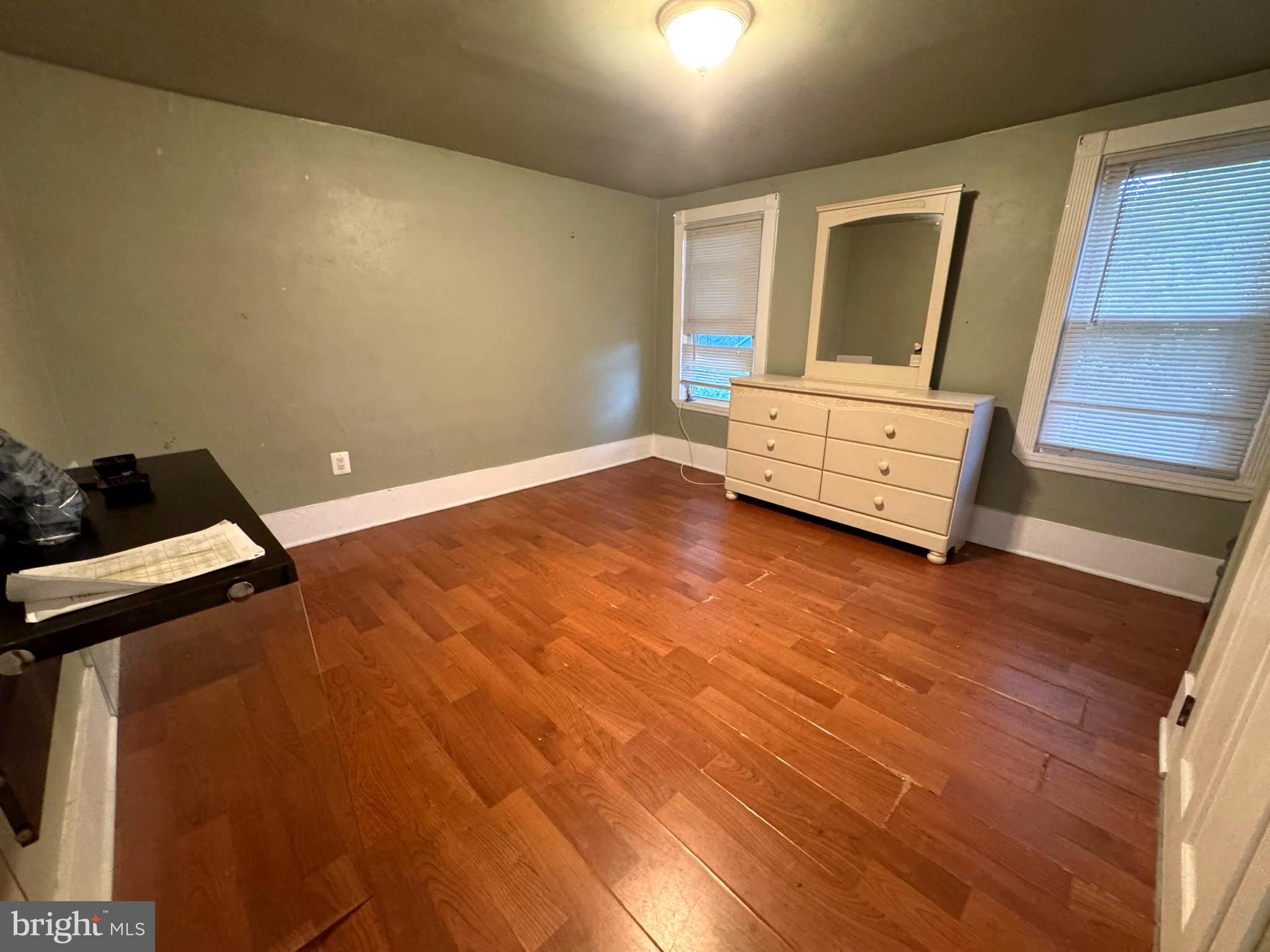 279-281 Arch Street Palmyra, NJ 08065 - Photo 28 of 29 a view of an empty room and wooden floor