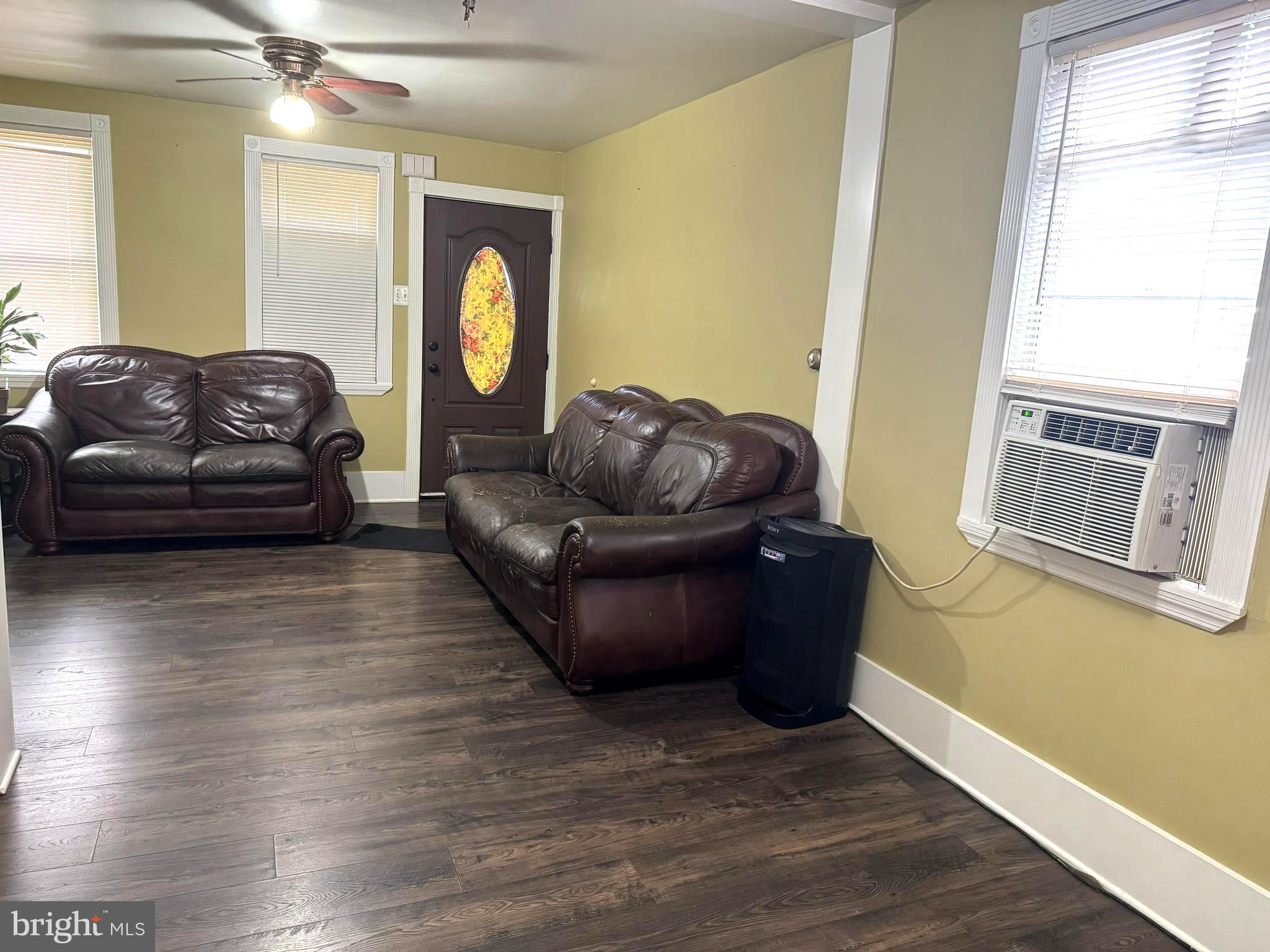 279-281 Arch Street Palmyra, NJ 08065 - Photo 4 of 29 a living room with furniture and a window