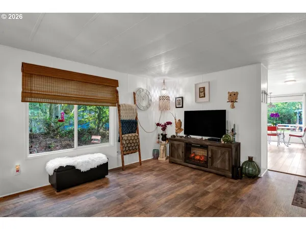 a kitchen with a table and chairs