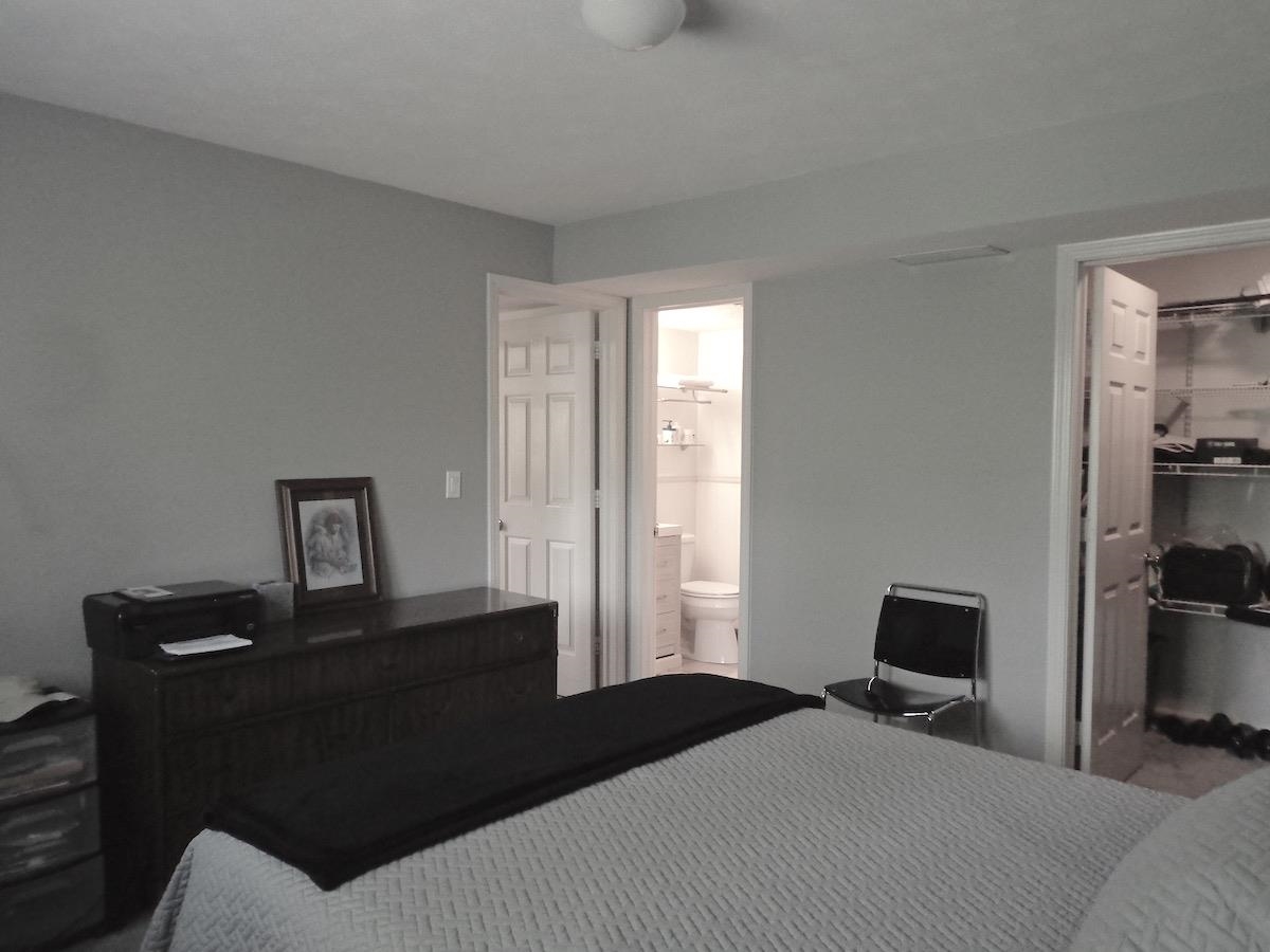 5724 Spring Brook Road Rockford, IL 61114 - Photo 18 of 37 a bedroom with a bed and a window
