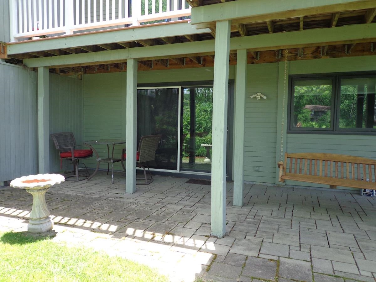 5724 Spring Brook Road Rockford, IL 61114 - Photo 35 of 37 a view of a small house with backyard