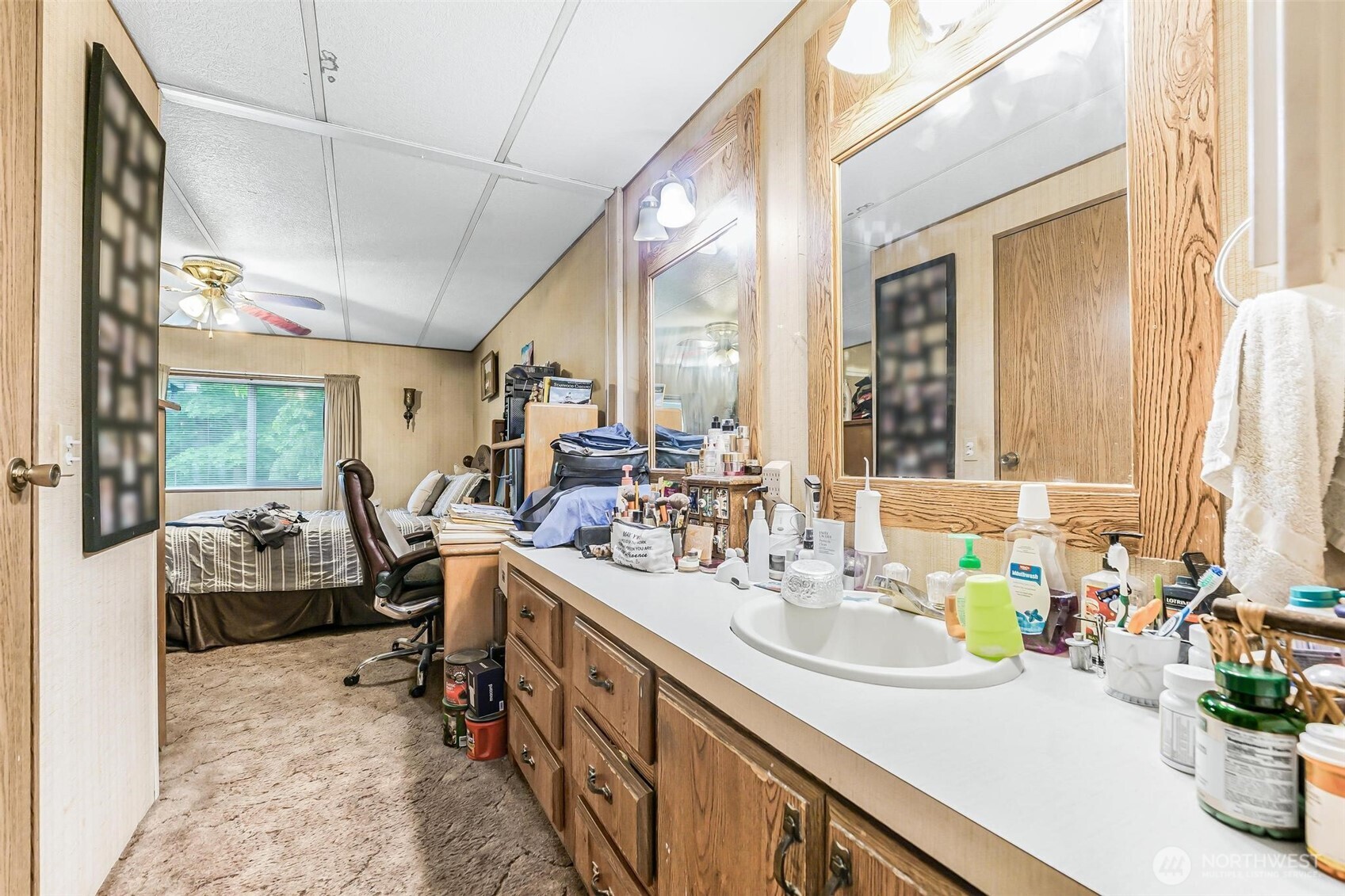 980 South Falcon Road Camano Island, WA 98282 - Photo 15 of 30 a bathroom with a sink double vanity and a mirror
