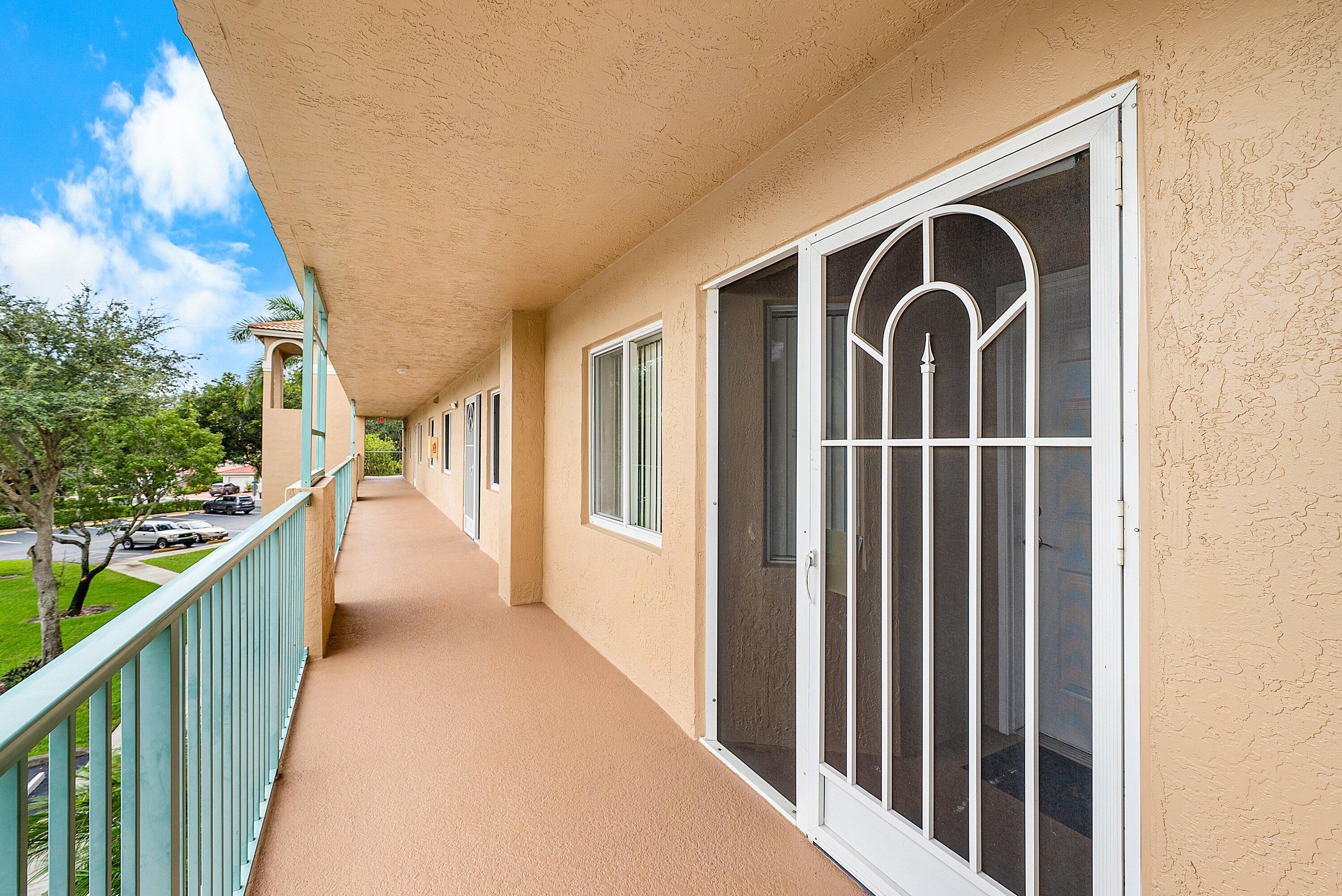 12560 Majesty Circle, Unit 303 Boynton Beach, FL 33437 - Photo 2 of 33 a view of front door