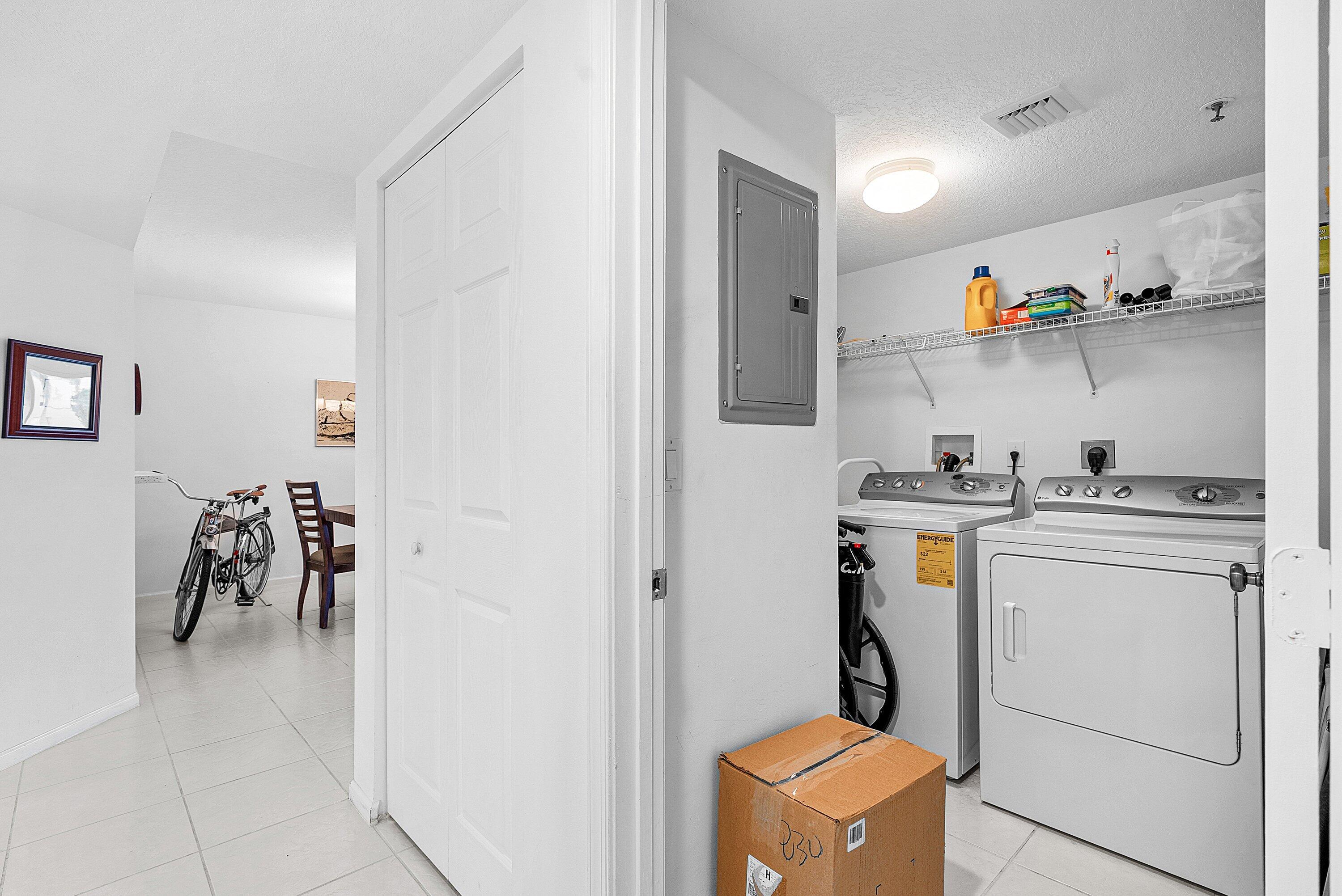 12560 Majesty Circle, Unit 303 Boynton Beach, FL 33437 - Photo 28 of 33 a room with storage and utility