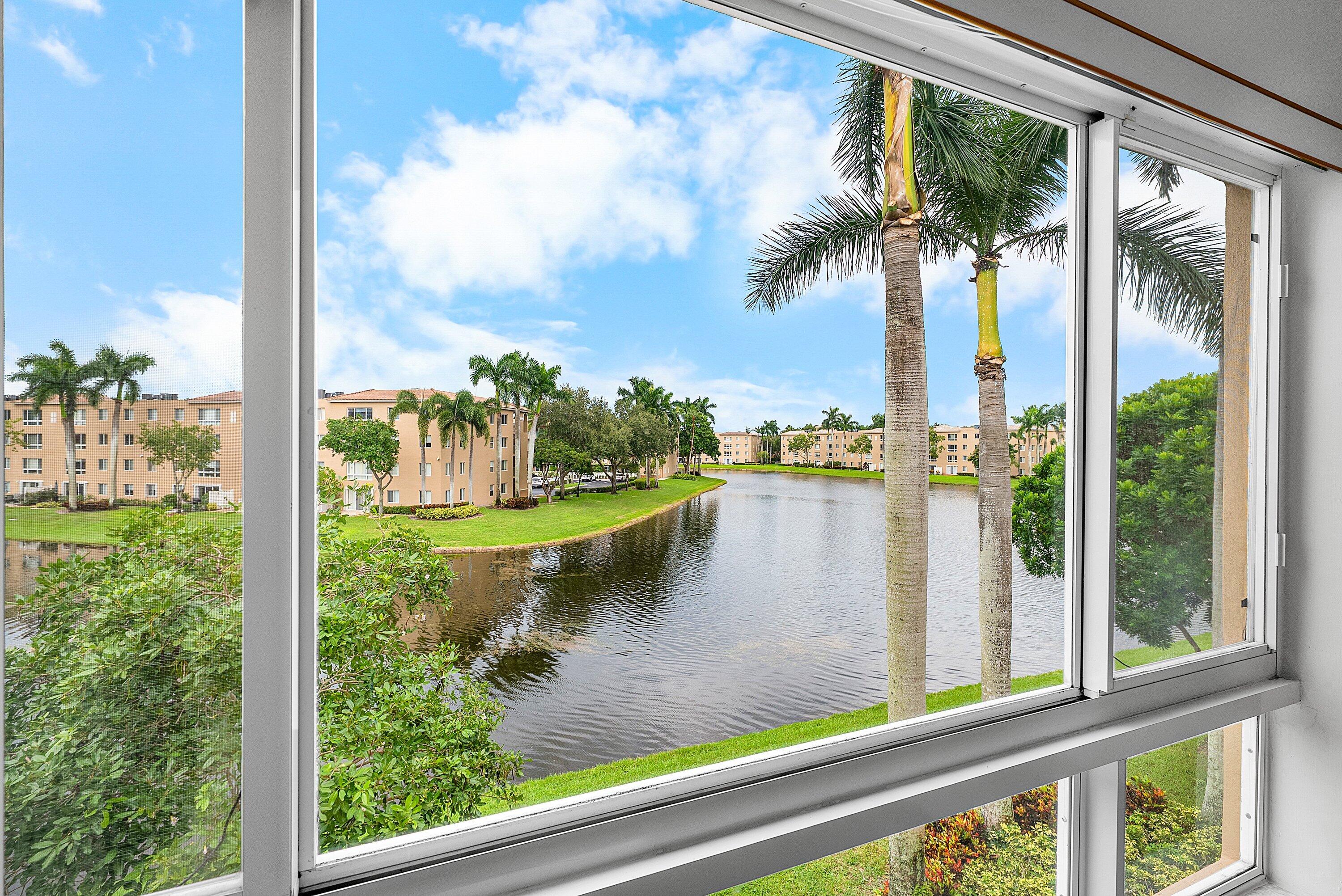 12560 Majesty Circle, Unit 303 Boynton Beach, FL 33437 - Photo 29 of 33 a view of a lake view