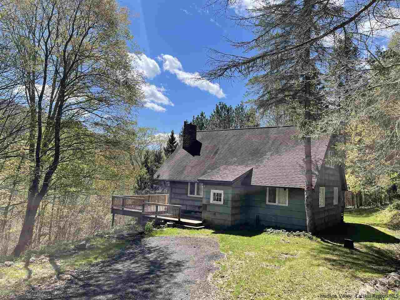 187 Deer Run Road Roxbury, NY 12421 - Photo 1 of 28 a front view of a house with garden