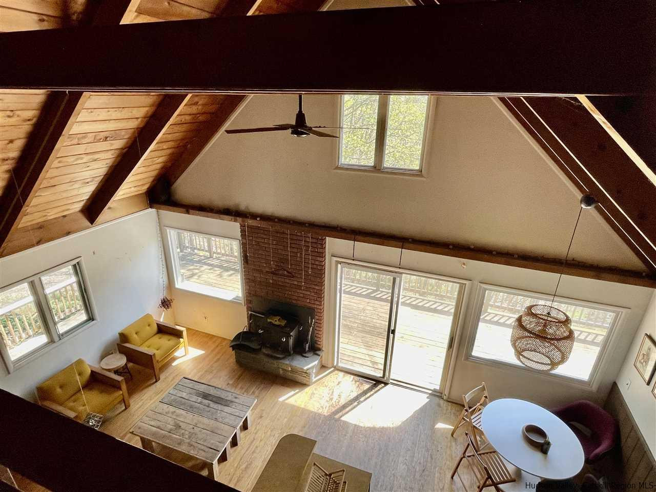 187 Deer Run Road Roxbury, NY 12421 - Photo 17 of 28 a living room with furniture and a window