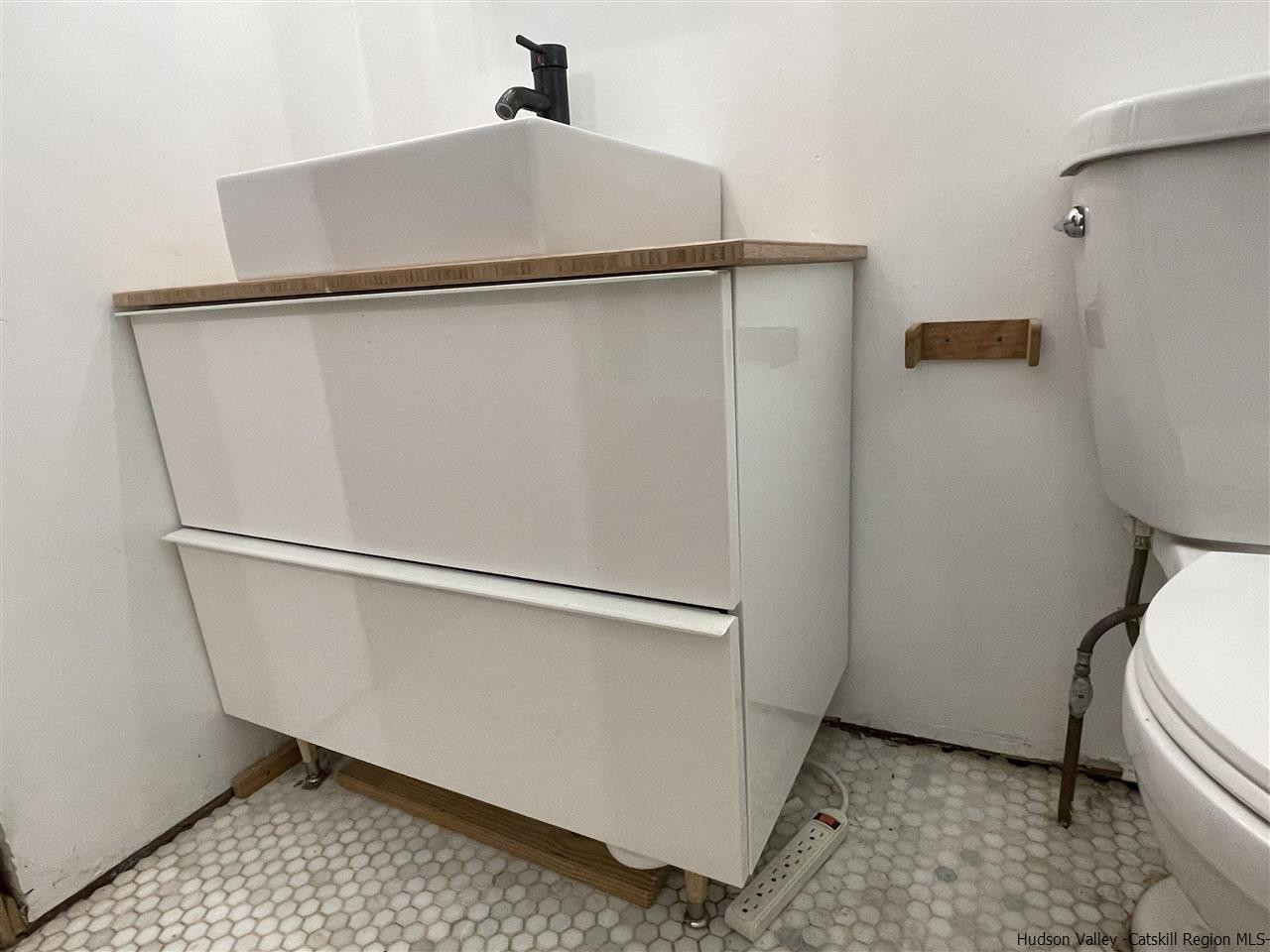 187 Deer Run Road Roxbury, NY 12421 - Photo 23 of 28 a close view of a closet and a utility room with dryer and washer