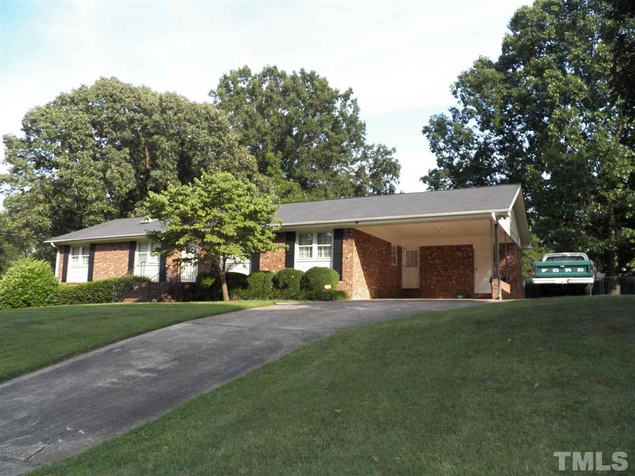 5204 Knollwood Road Raleigh, NC 27609 - Photo 1 of 25 a front view of house with yard and green space