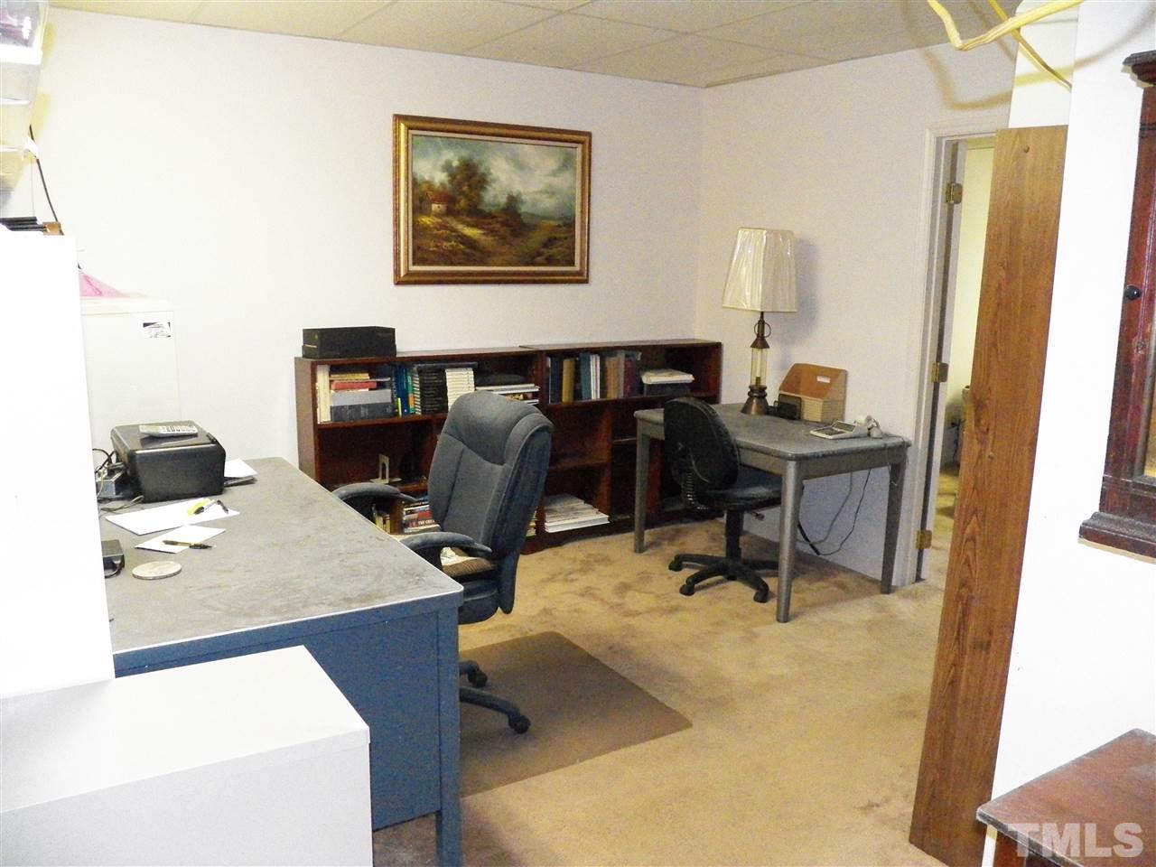 5204 Knollwood Road Raleigh, NC 27609 - Photo 19 of 25 a view of a workspace with furniture