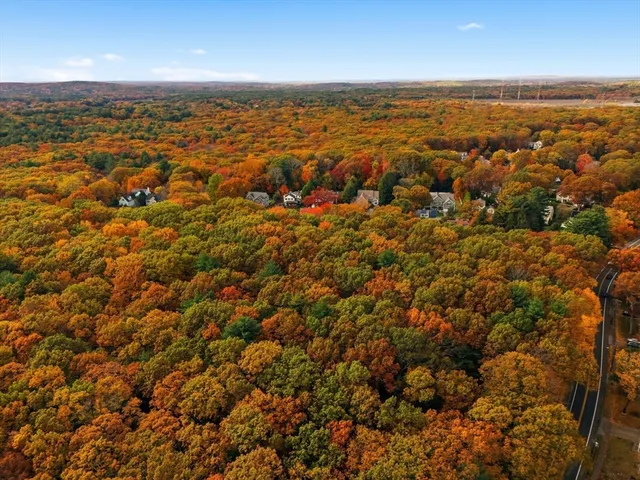 an aerial view of residential building with parking space