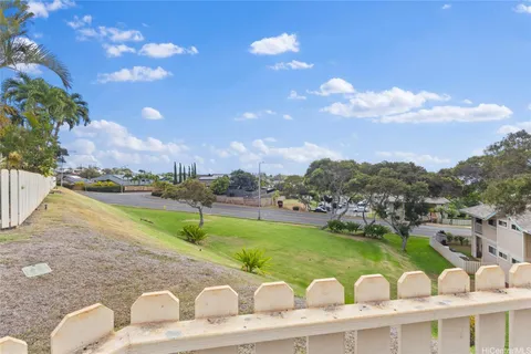 a view of a lake with a yard