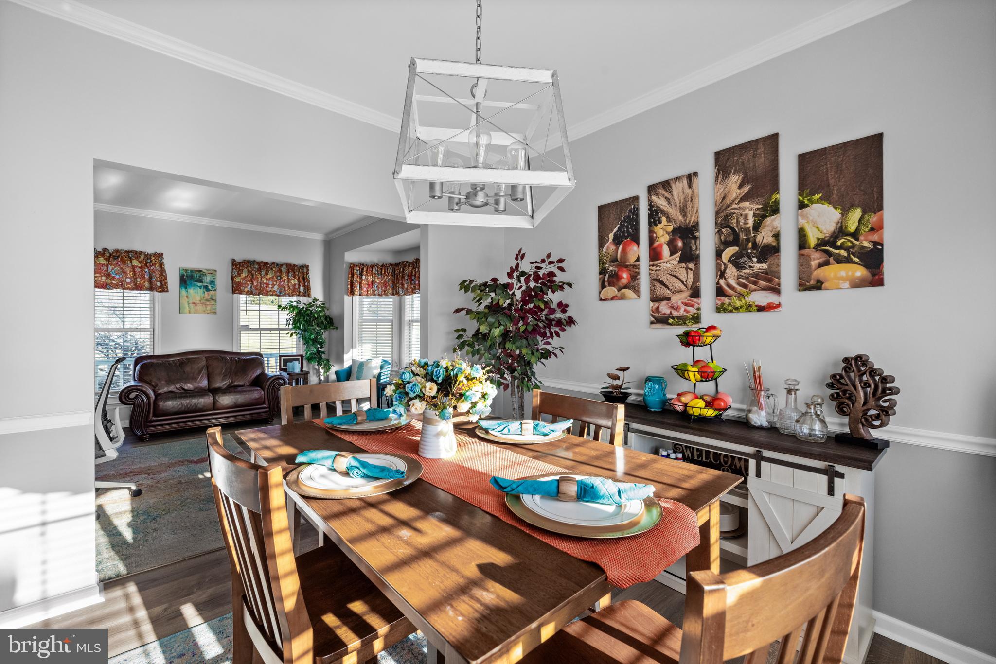 404 Pinnacle Drive Bunker Hill, WV 25413 - Photo 11 of 36 a view of a dining room with furniture and wooden floor