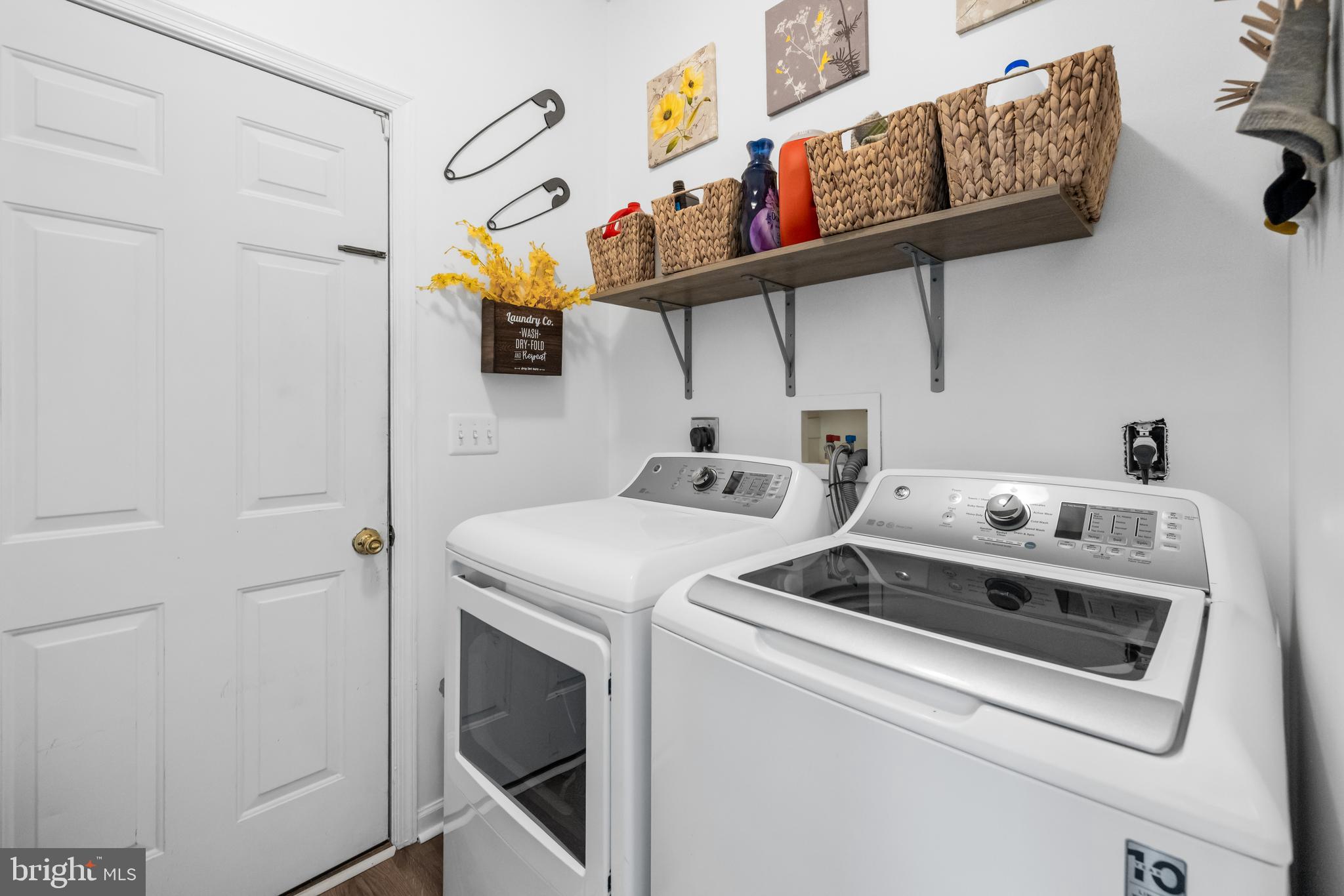 404 Pinnacle Drive Bunker Hill, WV 25413 - Photo 25 of 36 a utility room with dryer and washer