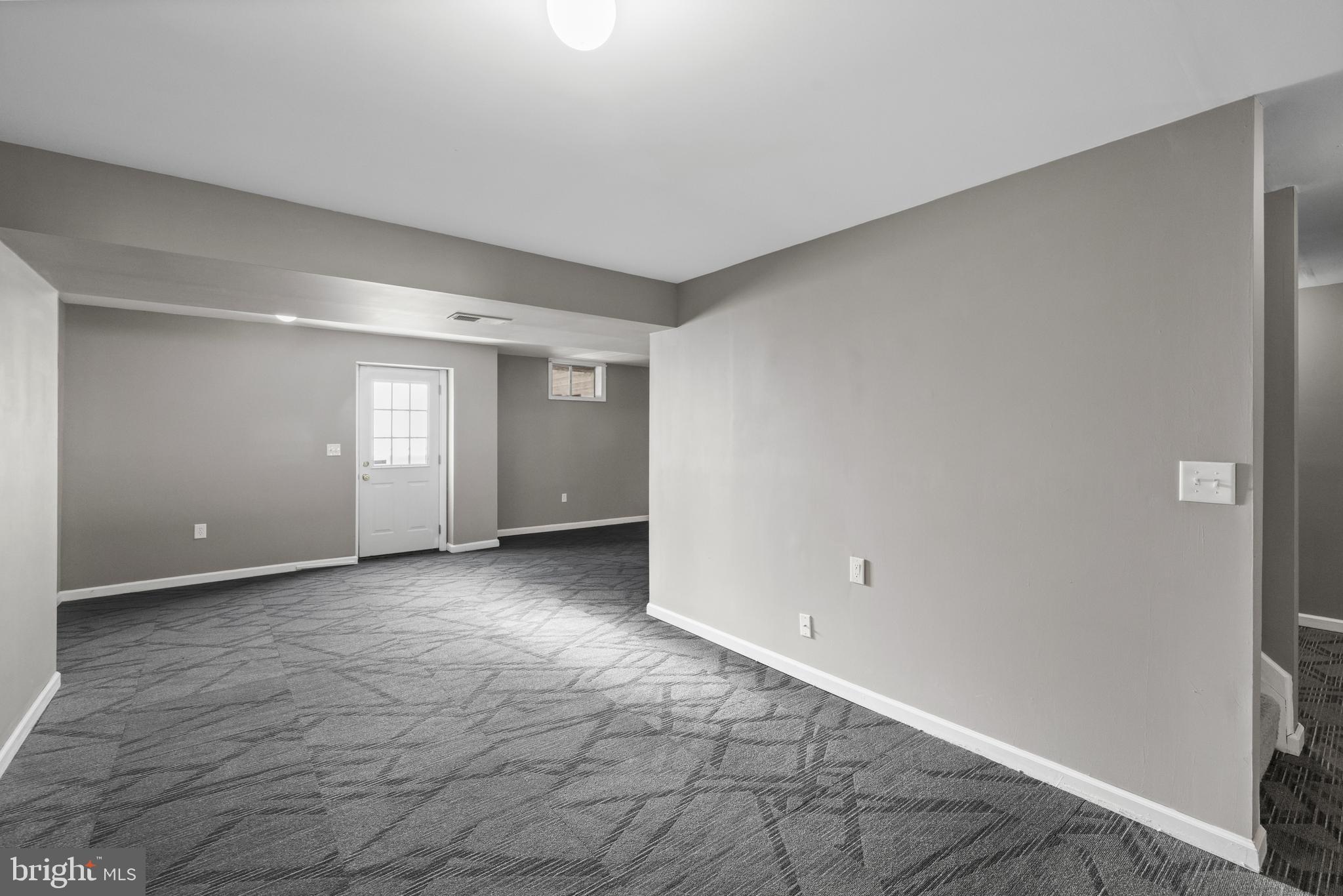 404 Pinnacle Drive Bunker Hill, WV 25413 - Photo 27 of 36 a view of an empty room with window and closet area