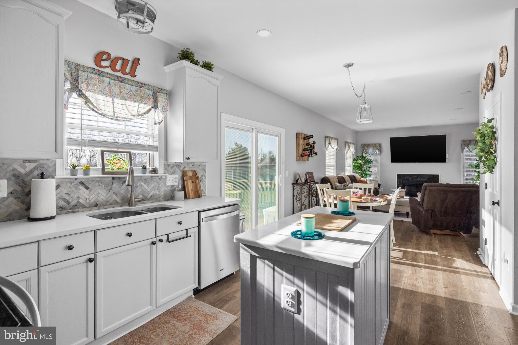 404 Pinnacle Drive Bunker Hill, WV 25413 - Photo 6 of 36 a kitchen with sink stove and cabinets