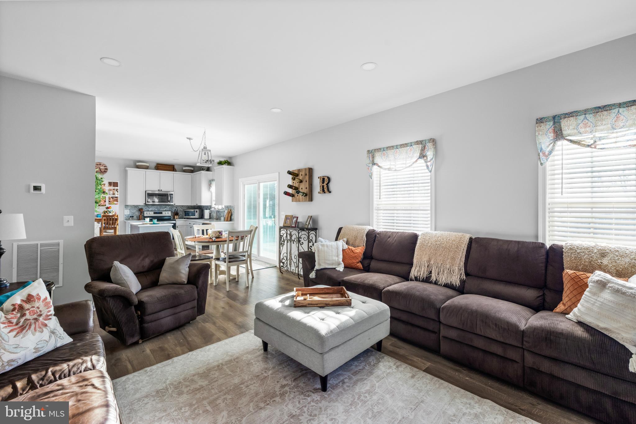 404 Pinnacle Drive Bunker Hill, WV 25413 - Photo 9 of 36 a living room with furniture and a window