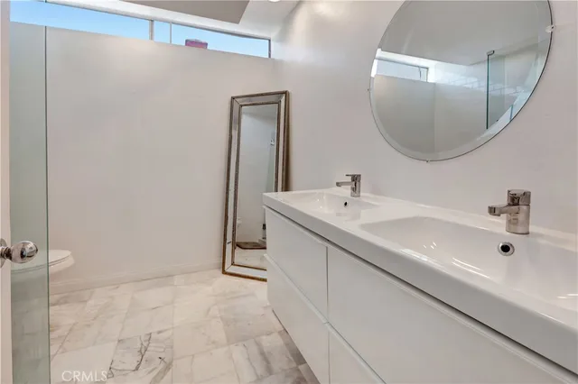 a view of a living room and a floor to ceiling window