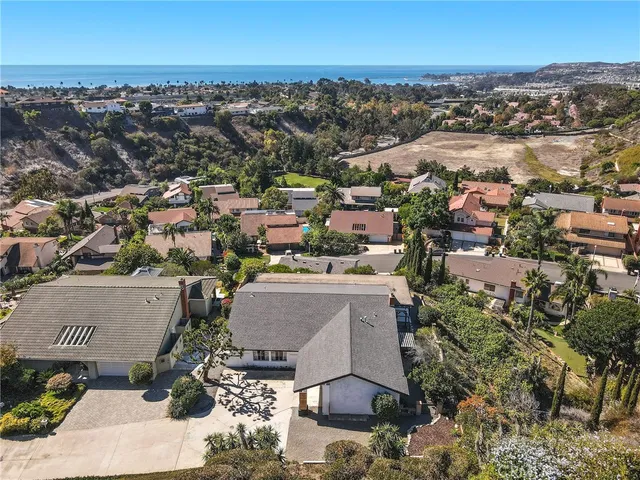 an aerial view of a house with a outdoor space