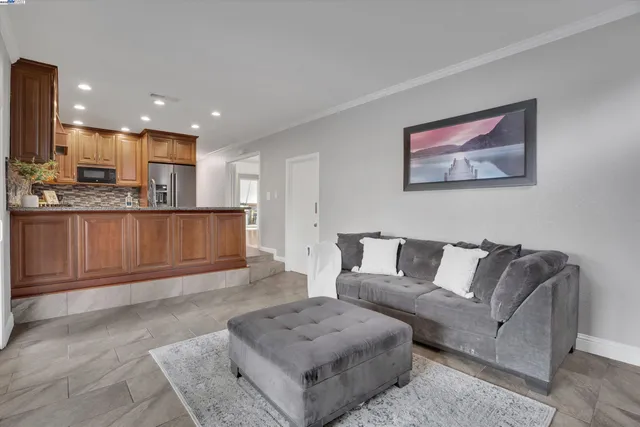 a living room with furniture and a couch