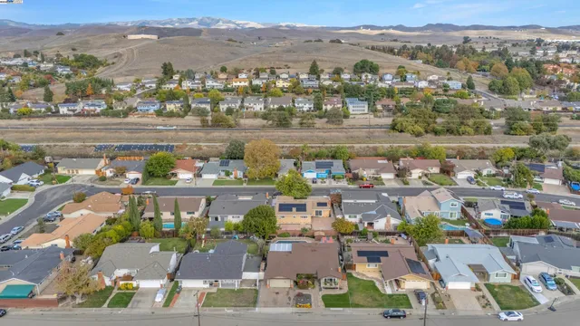 an aerial view of a city with lots of residential buildings