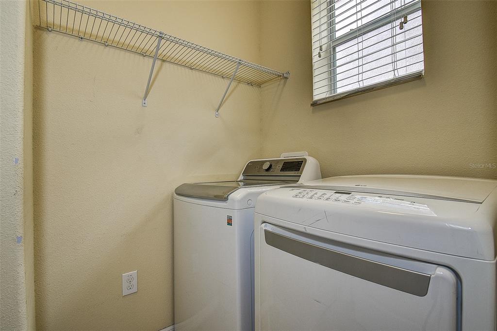 11656 Lake Boulevard New Port Richey, FL 34655 - Photo 21 of 55 a utility room with dryer and washer