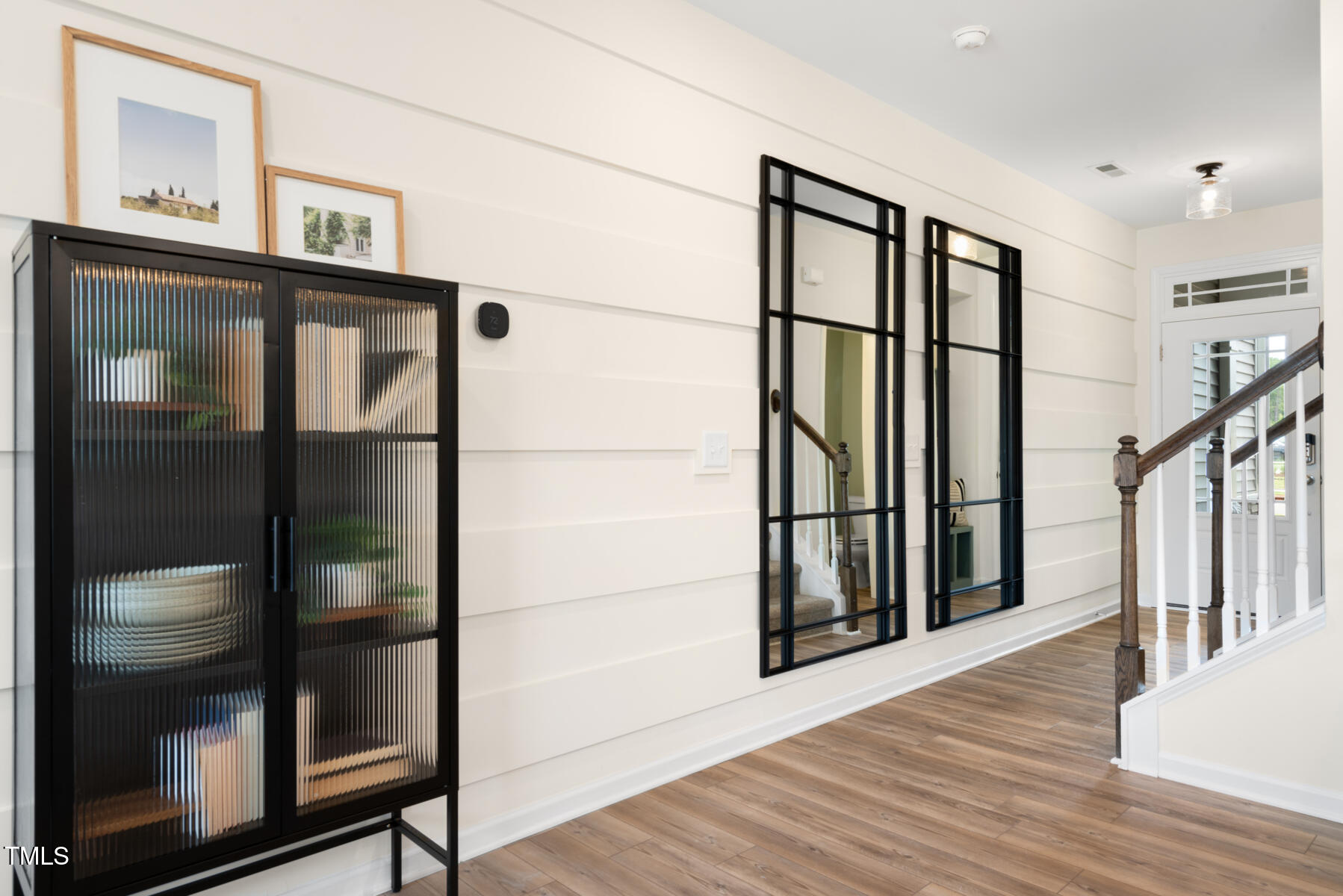 159 Siebold Street Garner, NC 27529 - Photo 13 of 36 a view of staircase with wooden floor