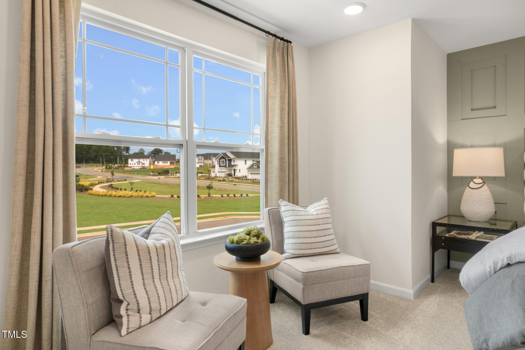 159 Siebold Street Garner, NC 27529 - Photo 31 of 36 a living room with furniture and a lamp