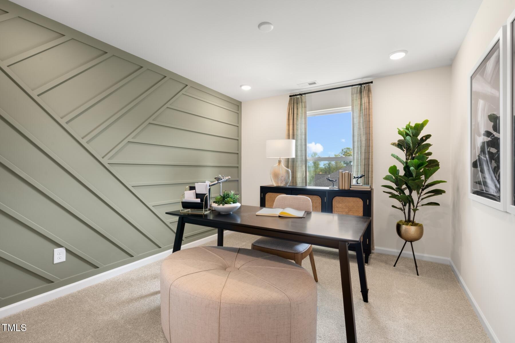 159 Siebold Street Garner, NC 27529 - Photo 36 of 36 a reading room with furniture and a potted plant