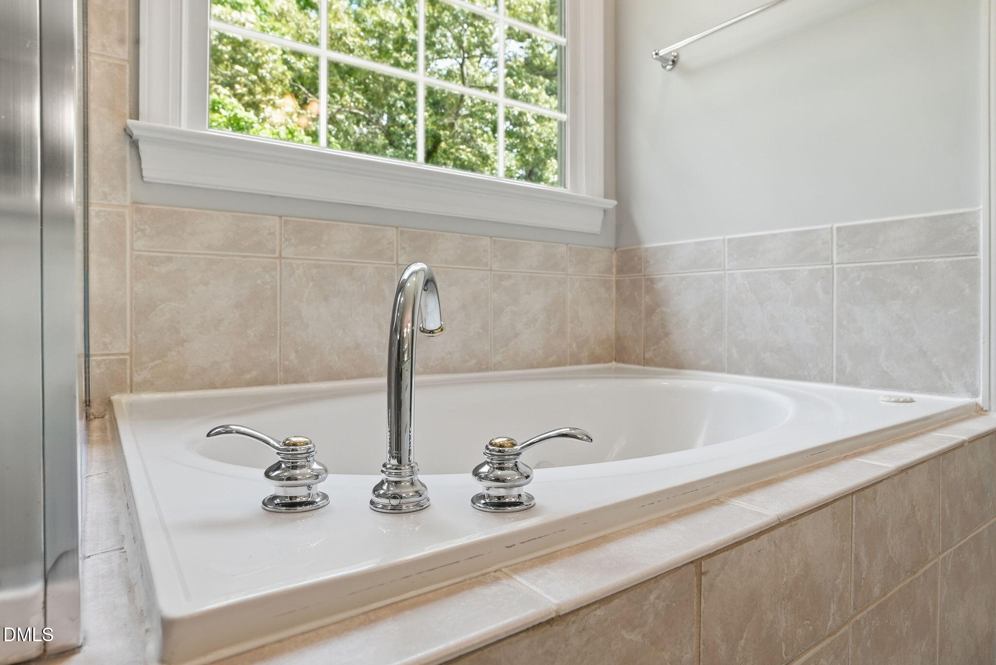 7 Morgans Ridge Lane Durham, NC 27707 - Photo 54 of 75 a bathroom with a sink and a window
