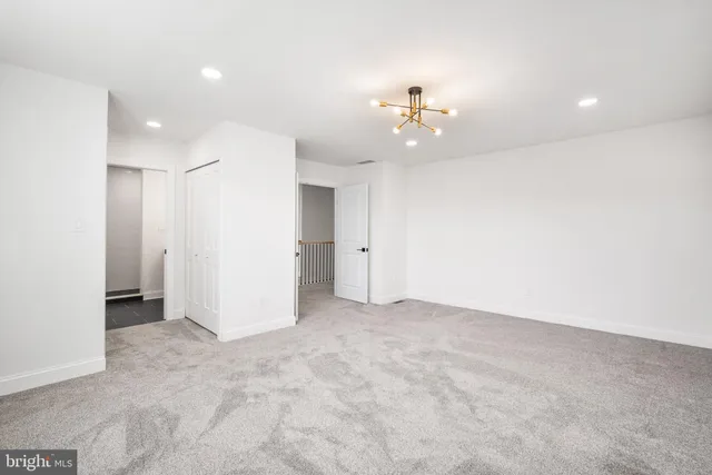 an empty room with a bathroom