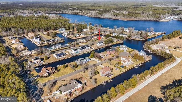 an aerial view of a balcony with chairs